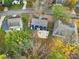 Aerial view showing house, backyard patio, and neighboring homes at 6934 Spring Morning Ln, Charlotte, NC 28227