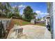 Cozy patio with seating area and adjacent storage shed at 6934 Spring Morning Ln, Charlotte, NC 28227