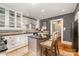 Well-equipped kitchen with granite countertops, custom cabinets, and a stylish island at 70 Spring Nw St, Concord, NC 28025