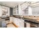 Bright kitchen features white cabinets, granite countertops and stainless steel appliances at 70 Spring Nw St, Concord, NC 28025