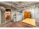 This laundry room features a washer and dryer and a wooden table at 70 Spring Nw St, Concord, NC 28025