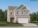 Two-story house with a neutral color scheme and a two-car garage at 1793 Otter Perch Ln, Fort Mill, SC 29715