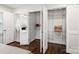 Large walk-in closet with wire shelving and ample storage at 1915 Wedgedale Dr, Charlotte, NC 28210