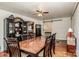 Farmhouse style dining room with hardwood floors and barn door at 316 Brawley Rd, Cleveland, NC 27013