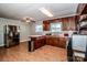 Updated kitchen with stainless steel appliances and wood cabinetry at 316 Brawley Rd, Cleveland, NC 27013