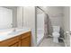 Bathroom with shower/tub combo and wood vanity at 6941 Augustine Way, Charlotte, NC 28270