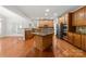 Eat-in kitchen with island and ample cabinet space at 6941 Augustine Way, Charlotte, NC 28270