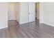This bedroom features modern vinyl flooring and multiple closets for ample storage space at 1101 E Morehead St # 32, Charlotte, NC 28204