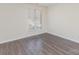 Bright bedroom showcasing modern wood floors and ample natural light at 1101 E Morehead St # 32, Charlotte, NC 28204