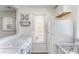 Bright kitchen featuring white appliances, marbled countertops, and ample storage space at 1101 E Morehead St # 32, Charlotte, NC 28204
