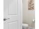 Tastefully designed powder room features stylish fixtures and neutral decor at 159 Tanner Loop, Troutman, NC 28166