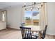 Dining area features a chandelier and views of the backyard at 159 Tanner Loop, Troutman, NC 28166