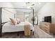 Spacious main bedroom features a ceiling fan and ample natural light at 159 Tanner Loop, Troutman, NC 28166