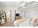 Large main bedroom featuring a ceiling fan and a view of the ensuite bathroom at 159 Tanner Loop, Troutman, NC 28166