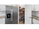 Spacious pantry and stainless steel refrigerator at 159 Tanner Loop, Troutman, NC 28166
