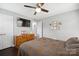 Bedroom with double bed, dresser, and wall-mounted TV at 1926 Hopewell Church Rd, Sherrills Ford, NC 28673