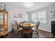 Charming dining room with round table, wood chairs, and built-in hutch at 1926 Hopewell Church Rd, Sherrills Ford, NC 28673