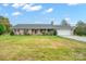 Charming ranch home with a two-car garage and manicured lawn at 1926 Hopewell Church Rd, Sherrills Ford, NC 28673