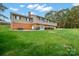 Back exterior of two-story home, showcasing landscaping at 1926 Hopewell Church Rd, Sherrills Ford, NC 28673