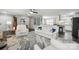 Living room with hardwood floors, white furniture and view of kitchen at 1926 Hopewell Church Rd, Sherrills Ford, NC 28673