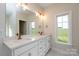Bathroom with marble floors and double sink vanity at 3034 Buffet Ln, Monroe, NC 28110