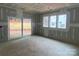 Unfinished basement with sliding door access to patio at 1017 Wandsworth Pl # Ken0108, Charlotte, NC 28215