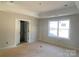 Bright and airy bedroom with ample space and closet at 1017 Wandsworth Pl # Ken0108, Charlotte, NC 28215