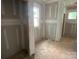 Unfinished bedroom with drywall and window at 1017 Wandsworth Pl # Ken0108, Charlotte, NC 28215