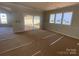 Bright dining room with sliding glass doors leading to a patio at 1017 Wandsworth Pl # Ken0108, Charlotte, NC 28215