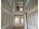 Interior view of a house under construction, showing the framing and drywall at 1017 Wandsworth Pl # Ken0108, Charlotte, NC 28215