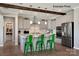 Modern kitchen with gray cabinets, stainless steel appliances, and a large island at 1017 Wandsworth Pl # Ken0108, Charlotte, NC 28215