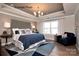 Luxurious main bedroom with sitting area and large windows at 1017 Wandsworth Pl # Ken0108, Charlotte, NC 28215