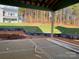 Covered patio with view of backyard and wooded area at 1017 Wandsworth Pl # Ken0108, Charlotte, NC 28215