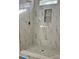 Elegant bathroom with marble-style tile shower and a hexagonal floor at 1176 Greenheather Dr, Salisbury, NC 28147