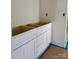 Unfinished white bathroom vanity ready for installation at 1176 Greenheather Dr, Salisbury, NC 28147