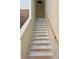 Unfinished white staircase with a simple wooden handrail at 1176 Greenheather Dr, Salisbury, NC 28147