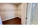 Walk-in closet featuring wire shelving and dark hardwood flooring at 126 E Northstone Rd, Mooresville, NC 28115