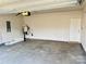 Spacious garage with water heater and plenty of room for storage and vehicles at 126 E Northstone Rd, Mooresville, NC 28115