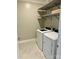 Laundry room with shelving, tile flooring and a modern washer and dryer at 126 E Northstone Rd, Mooresville, NC 28115