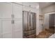 Walk-in pantry with stainless steel refrigerator and custom cabinetry at 229 Golf Course Rd, Maiden, NC 28650