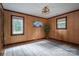 Bedroom with natural light, wood-look walls and ample space at 231 Cheek Rd, Clover, SC 29710