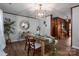 Inviting dining room with hardwood floors, white walls, and stylish decor at 231 Cheek Rd, Clover, SC 29710