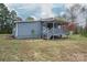 Charming home with a covered porch and a well-maintained lawn at 231 Cheek Rd, Clover, SC 29710