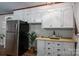 Well-lit kitchen featuring white cabinets and stainless steel appliances at 231 Cheek Rd, Clover, SC 29710