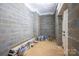 Unfinished basement featuring cinder block walls at 6630 Vesuvius Furnace Rd # 1, Denver, NC 28037