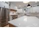 Bright kitchen featuring stainless steel appliances, a large island, and custom white cabinetry at 6630 Vesuvius Furnace Rd # 1, Denver, NC 28037