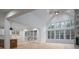 Spacious living area with large windows, wood floors, and an open layout at 6630 Vesuvius Furnace Rd # 1, Denver, NC 28037