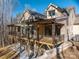 A large two-level covered back porch provides ample room for outdoor relaxation at 6630 Vesuvius Furnace Rd # 1, Denver, NC 28037