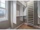 Walk-in closet with open shelving and natural light for easy organization and display at 6630 Vesuvius Furnace Rd # 1, Denver, NC 28037