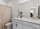 Clean bathroom with single vanity and shower/tub combo at 118 Berkeley Ave # D, Mooresville, NC 28117